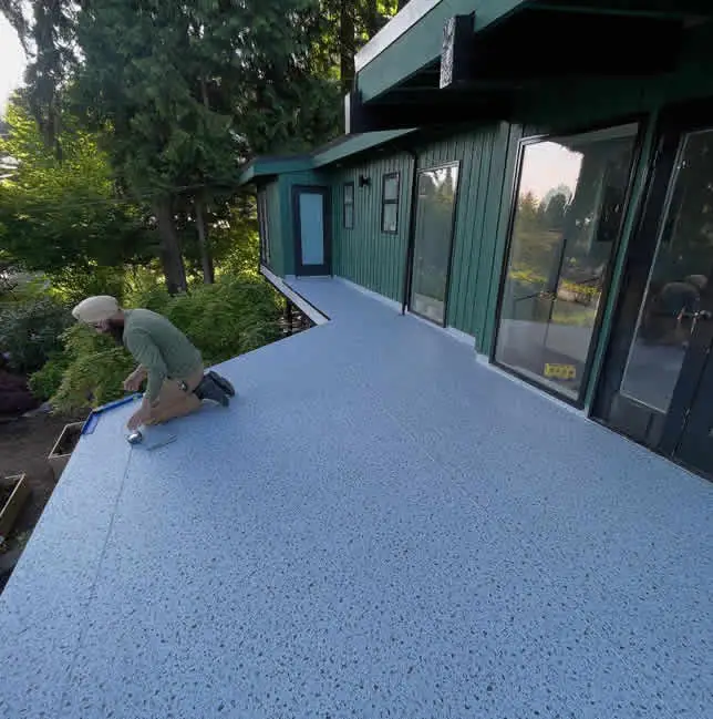 Experienced deck builder completing a professional residential deck restoration in Port Moody